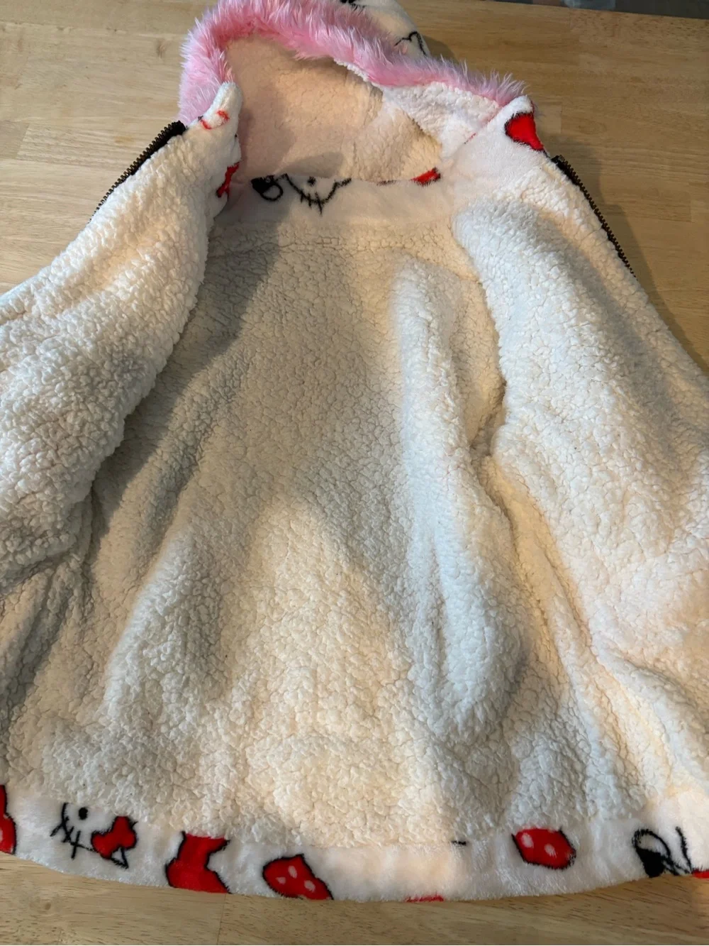 Hello Kitty White Plush Zip-Up Hoodie with Red Accents and Pink Fur Hood Trim